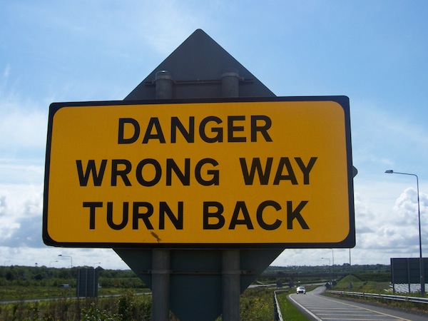 Yellow-Road-Sign-Saying-Danger-Wrong-Way-Turn-Back